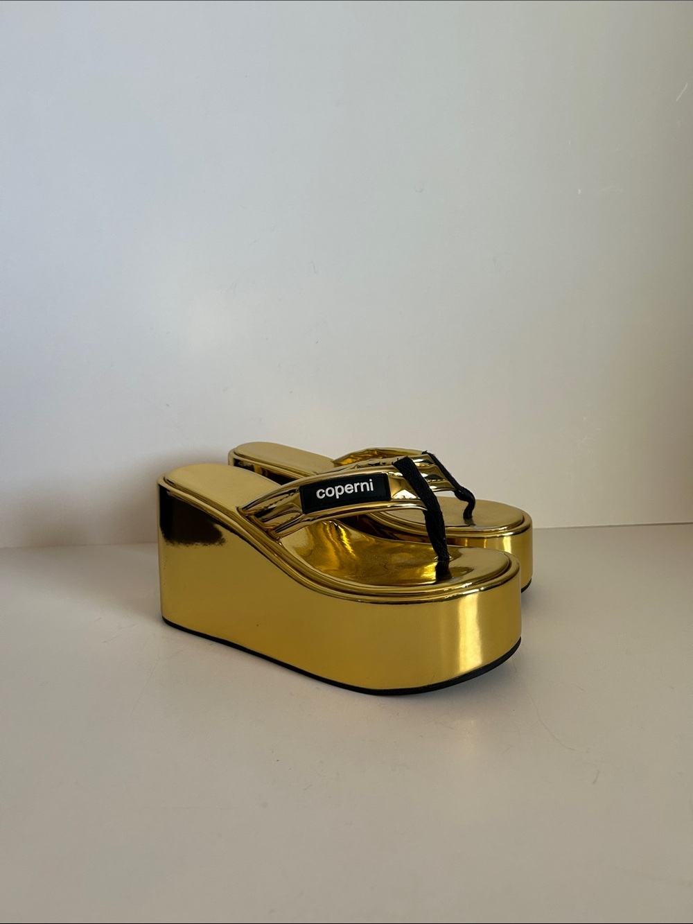 Coperni Gold Platform Flip Flop Wedges